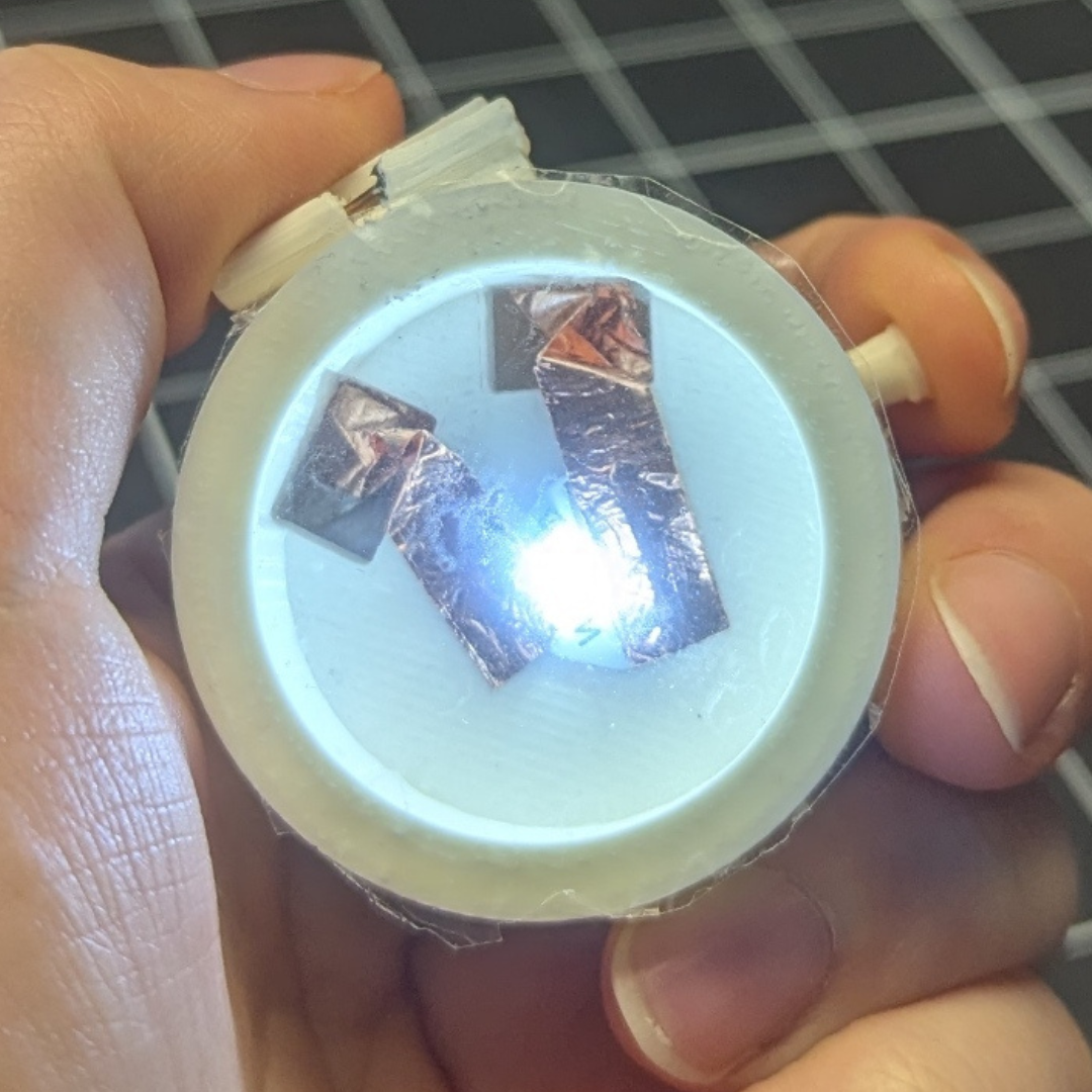 And there it is turned on as well there is also a duct tape on top, so I can place the painting on it and protect the LED from getting damaged when I transport it around.